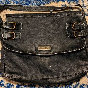 Roxy black faux leather distressed purse with buckles.